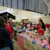 Shoppers browse the stalls at Red River's Christmas holiday market.