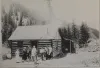 The historic Melson-Oldham cabin, a log home from Red River's mining era.
