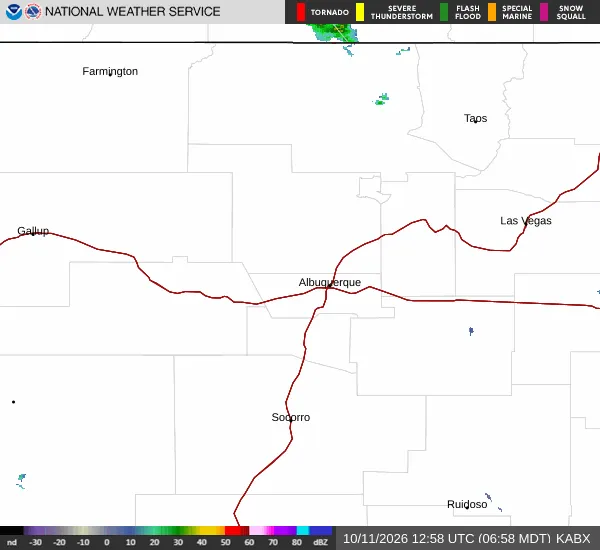 NEXRAD radar from the Albuquerque National Weather Service site showing scattered light precipitation echoes near the New Mexico-Colorado state line, with quiet skies over the Red River area on Sunday morning.