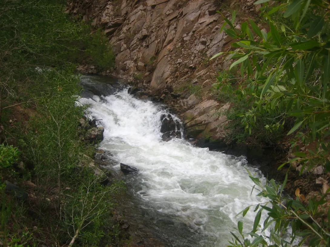 The Red River rushing through a rocky canyon pinch near Red River, New Mexico.