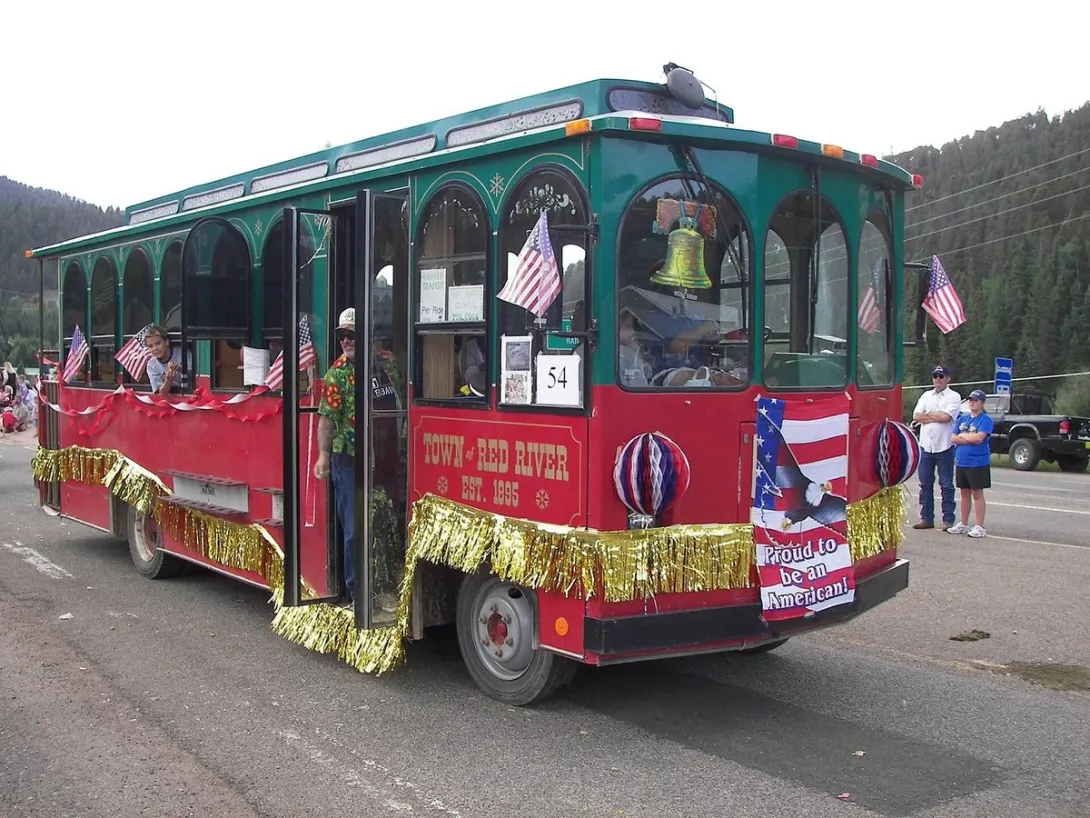 The Red River trolley rolls down Main Street in the town's Fourth of July parade in 2007.