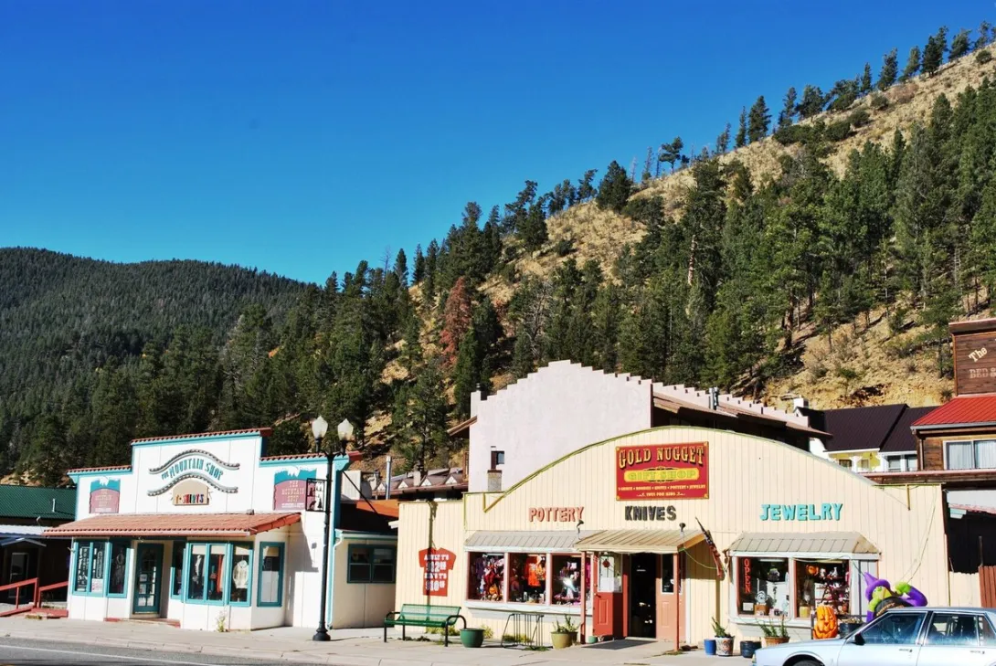 Fall color lines Main Street in Red River in this 2012 photograph of the town's storefronts.